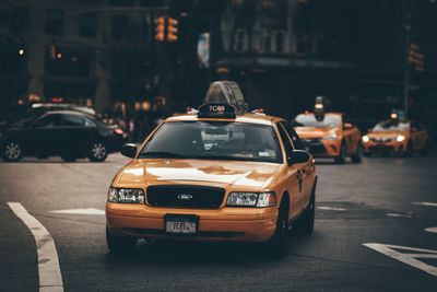 Cars parked on city street