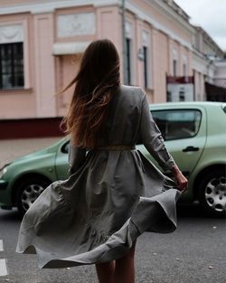 Rear view of woman on street