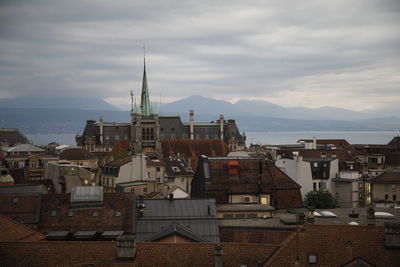 High angle view of buildings in city against sky