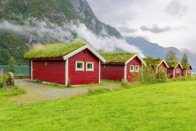 House on field against sky