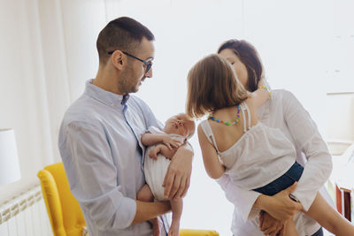 Doctor examining patient at home