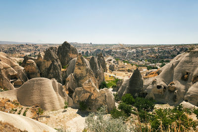 Aerial view of rock formations against sky