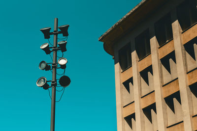 Low angle view of street light against sky