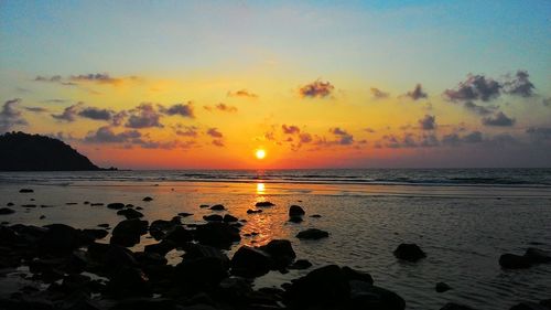 Scenic view of sea at sunset