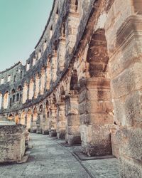 Old ruins of building against sky