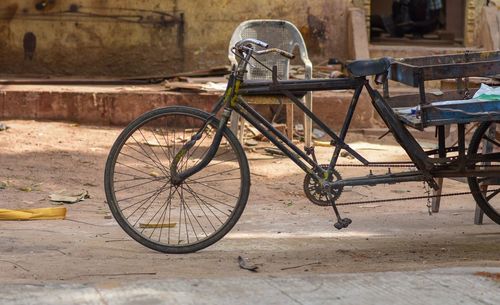 Bicycle parked on footpath in city