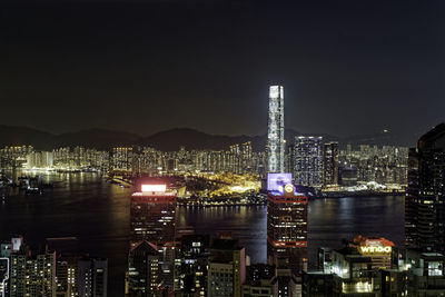 Illuminated buildings in city at night