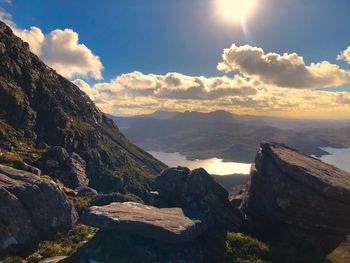 Scenic view of mountains against sky during sunset