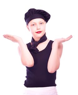 Portrait of beautiful young woman against white background