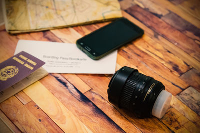 High angle view of smart phone on table