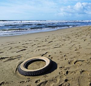 Scenic view of beach against sky