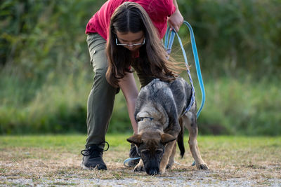 Girl with dog at park