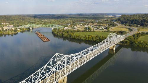 High angle view of river amidst landscape against sky