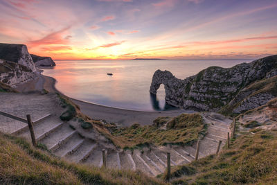 Scenic view of sea against sky during sunset