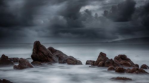 Scenic view of sea against sky during winter