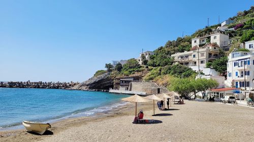 Scenic view of beach against clear sky