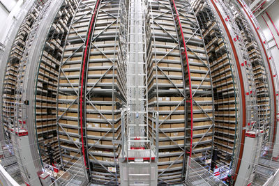 High angle view of automated warehouse. plastic boxes put in the pallet in shelf rack in warehouse.