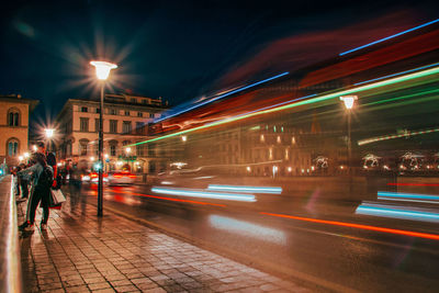 Light trails on city street at night