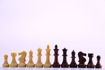 Full frame shot of chess board against white background