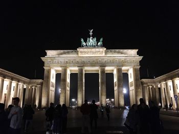 Low angle view of statue at night