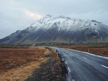 Road in snowcapped mountains