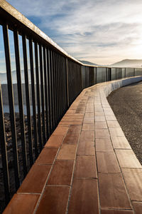 View of bridge against cloudy sky