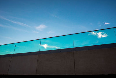 Low angle view of building against blue sky