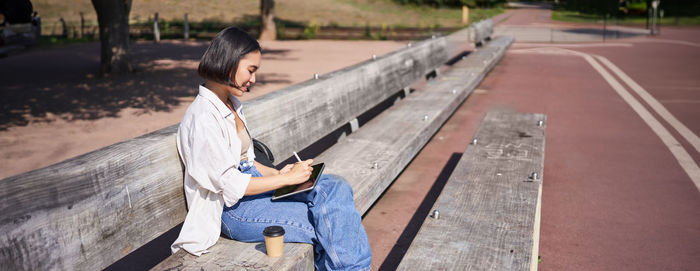 Young woman using mobile phone