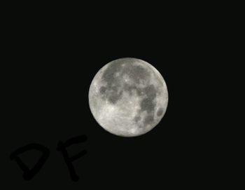 Low angle view of moon in sky