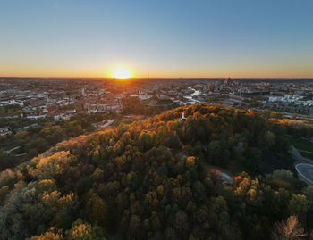 High angle view of cityscape against sky during sunset