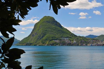 Lanscape view of the beautiful monte san salvatore  and the lake lugano on a sunny day