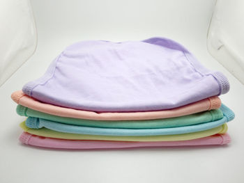 Close-up high angle view of colored pencils on table