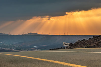 Scenic view of landscape against sky during sunset