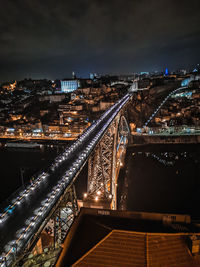 High angle view of illuminated d. luiz bridge over douro river at night