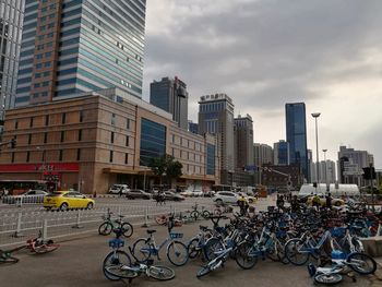 Bicycles against modern buildings in city