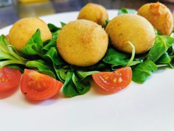 Close-up of fruits in plate