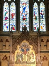 Low angle view of stained glass window