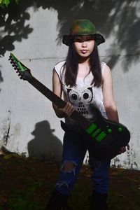 Portrait of a young woman wearing hat