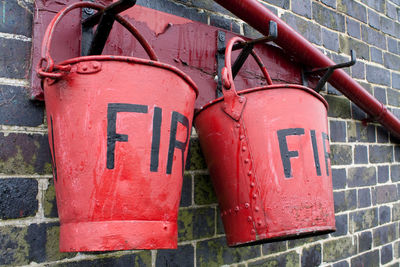 Close-up of fire red buckets