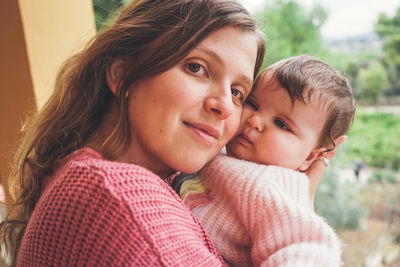 Portrait of mother and daughter