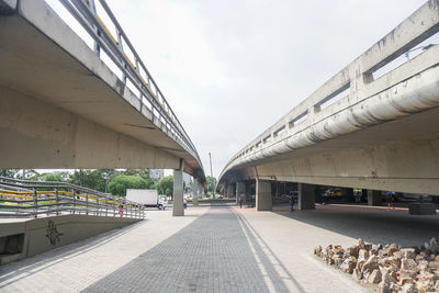 View of bridge over road in city