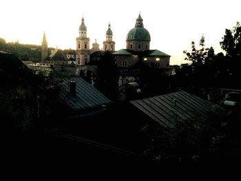 Buildings in city against sky