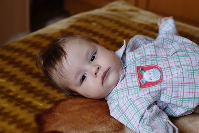 Portrait of cute baby lying down