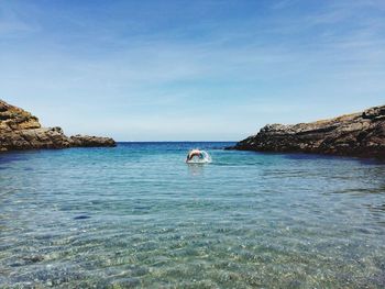 View of calm blue sea against the sky