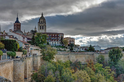 Dark clouds over the cathedral of segovia in spain