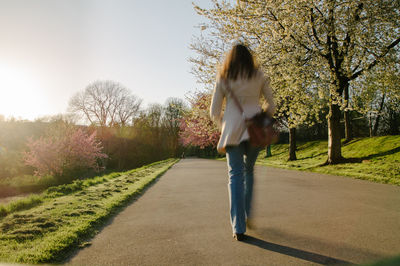 Full length of woman walking in park