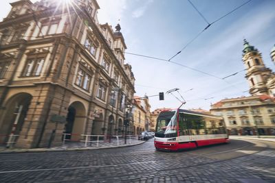 Daily life in city. modern tram of public transportation in blurred motion.