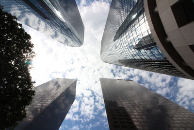 Low angle view of modern buildings against sky