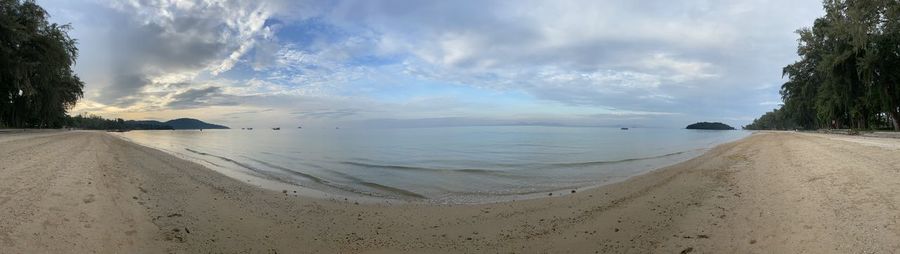 Panoramic view of beach against sky