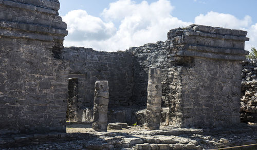 Old ruin building against cloudy sky